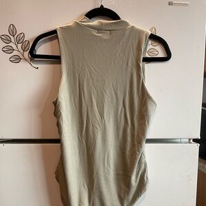 Papaya sage bodysuit with snap enclosure